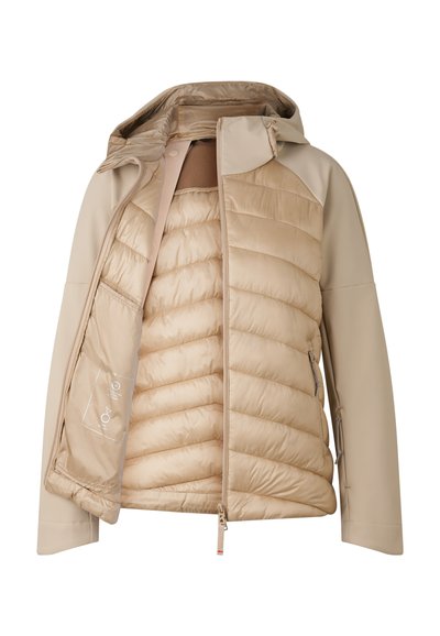 Beżowa zimowa kurtka z odpinanym ociepleniem, gładką powierzchnią, poziomym pikowanym wzorem i kapturem. Posiada zamek błyskawiczny oraz zatrzaski.