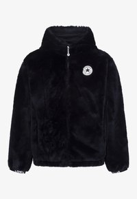Schwarze Kunstpelz-Hoodiejacke mit Reißverschluss und elastischen Bündchen. Mit rundem Logo-Patch auf der linken Brust und "CONVERSE"-Schriftzug auf den Bündchen.
