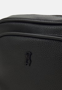 Steve Madden BLILLITE - Cross body bag - black