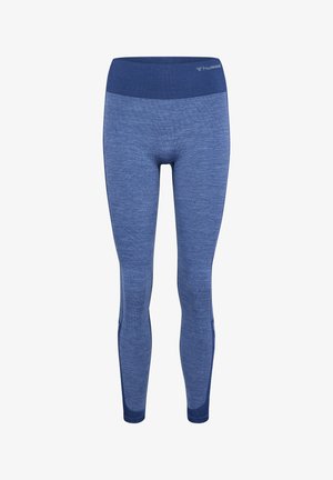 Mørkeblå leggings i et tekstureret, strækbart stof. Har en høj talje og sidelapper for fleksibilitet og bevægelse.