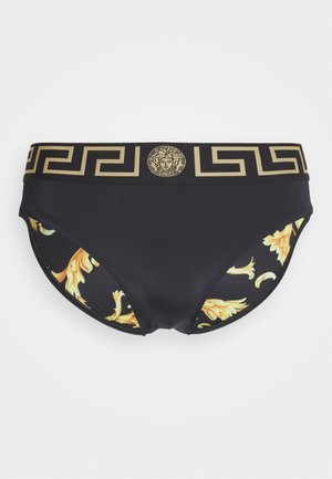 Black swim briefs with gold Greek key pattern and Medusa logo on the waistband; features decorative yellow accents on each side.