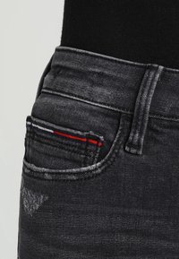 Tommy Jeans Vaqueros pitillo - black denim