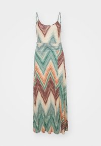 Maxi dress with spaghetti straps, featuring a zigzag pattern in shades of green, orange, and brown. Made from a textured, lightweight fabric.