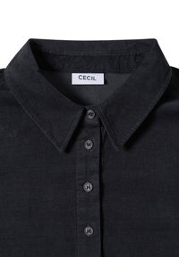 Schwarzes Cordhemd mit Kragen, das eine Knopfleiste und sechs passende Knöpfe aufweist. Der Stoff hat eine gerippte Struktur. Markenlabel: CECIL.