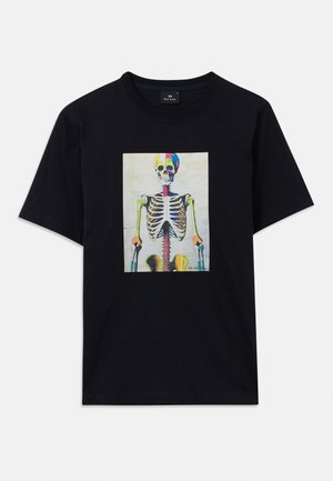 T-shirt en coton noir présentant un graphique de squelette coloré sur le devant dans des couleurs contrastées. Col rond, manches courtes, coupe régulière.