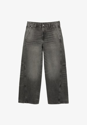 Spodnie jeansowe o szerokich nogawkach w przetartym czarnym denimu, z teksturowanym wykończeniem, czterema kieszeniami i widocznym szwem. Akcenty z łatami po bokach.