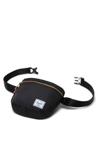 Black fanny pack made of durable fabric, featuring a gold zipper, a white logo patch, and adjustable straps with sleek hardware accents.