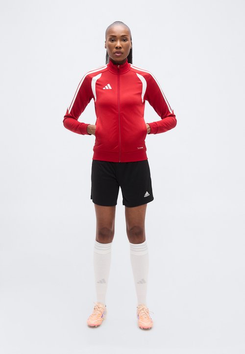 Veste effet cuir coupe féminine avec poches