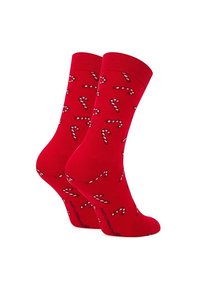 Czerwone skarpetki bawełniane z wzorem w cukrową laskę w białym i czarnym kolorze, z żeberkowanymi mankietami i gładką fakturą.