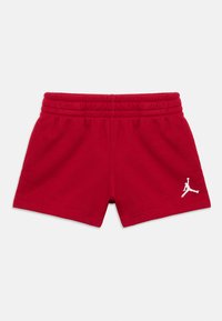 Κόκκινα βαμβακερά σορτς με ελαστική μέση, με λευκό λογότυπο Jumpman στο κάτω δεξί μέρος και ευθεία σχεδίαση τελειώματος.