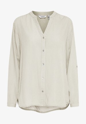 Košulja dugih rukava, svijetlozelena prugasta, s mandarin ovratnikom, koja ima ravni rub i suptilan sjaj. Dugmad su s prednje strane.