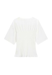 Blusa bianca con maniche corte, caratterizzata da una texture arricciata sul retro e un orlo a volant. Tessuto in cotone morbido con vestibilità comoda.