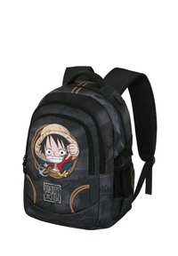 Mochila negra con un estampado de personaje de dibujos animados. Cuenta con cremalleras, correas acolchadas y bolsillos laterales de malla. Material texturizado con detalles de cuerda.