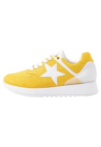 Yellow suede sneaker with white star detail, white laces, and thick white sole, shown from the outer side on a white background.