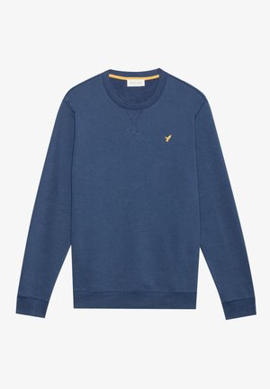 Granatowa bluza z długim rękawem typu crewneck z małym żółtym logo ptaka na lewej piersi oraz ściągaczami przy rękawach i u dołu.