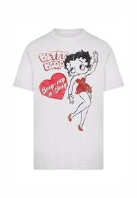 Weißes T-Shirt mit der Betty Boop Figur in rotem Kleid und hohen Schuhen, neben einem roten Herz mit dem Text "Boop-oop a-Doop."
