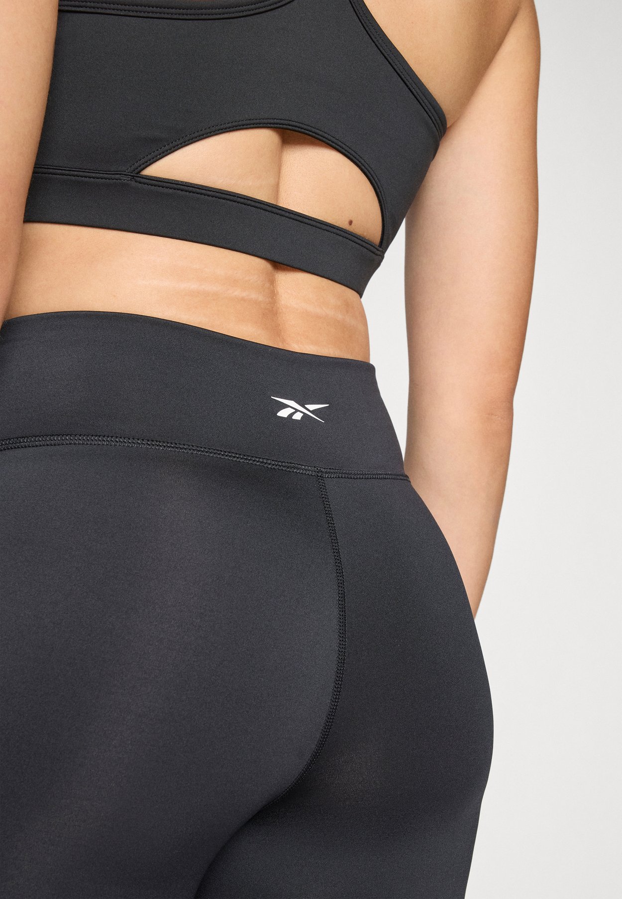TRAIN HIGH RISE BOOTCUT LEGGINGS