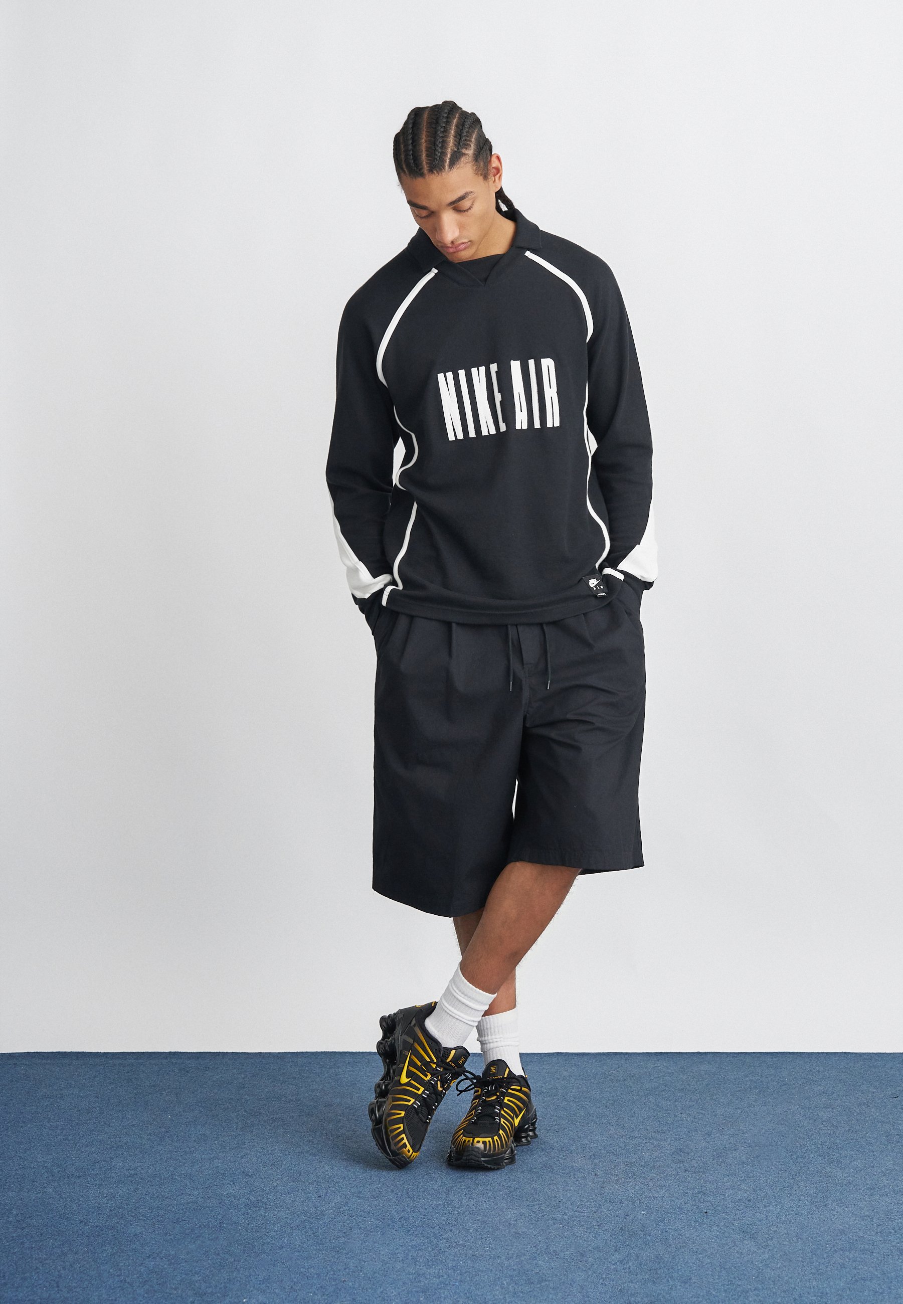 nike shox tl black and gold