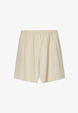 Vaaleat beiget shortsit, jotka on valmistettu kevyestä kankaasta. Ne sisältävät joustavan vyötärön, kaksi sivutaskua ja rennon istuvuuden.