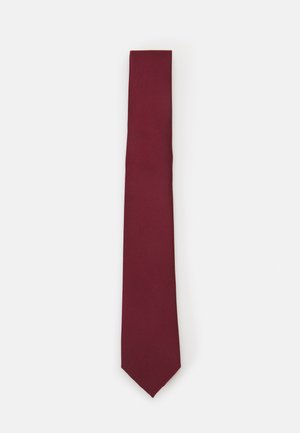 Cravatta in seta borgogna, forma stretta con una consistenza uniforme. Presenta una punta appuntita, un colore consistente e una finitura liscia.