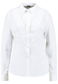 Weiße Bluse mit langen Ärmeln, tiefem V-Ausschnitt und Spitzenbesatz, Kragen und geknöpften Vorderseite. Aus einem weichen, glatten Material gefertigt und mit zarten Spitzenakzenten verziert.