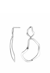 Srebrne kolczyki o płynnej, abstrakcyjnej formie z falistym, nieregularnym kształtem. Zawierają zwężany słupek do bezpiecznego noszenia i ruchu.