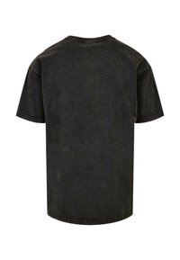 Sort kortærmet t-shirt i en afslappet pasform, med en blød tekstur og synlige sømme langs kraven og kanten.