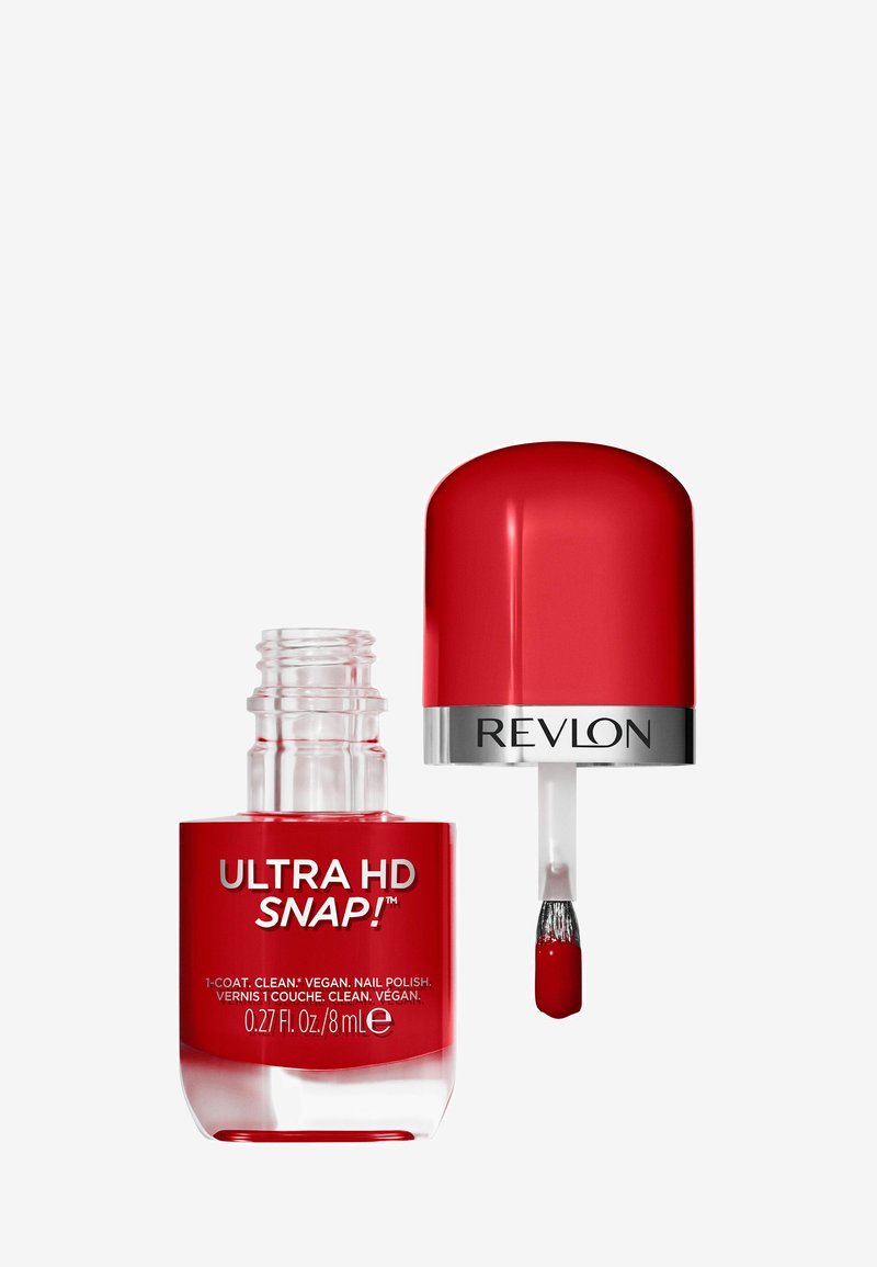 Röd vegansk nagellack i en klar glasflaska med ett glänsande röd lock. Utrustad med en penselapplikator, märkt "ULTRA HD SNAP!" och "REVLON."