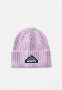 Lilac knitted beanie with ribbed texture, featuring a black triangular patch with mountain graphics and "TERREX" logo.
