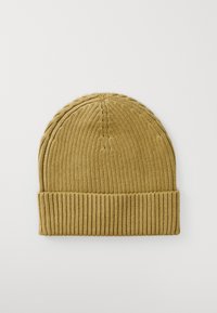 Knitted mustard yellow beanie with ribbed fold-over cuff and textured vertical knit pattern.