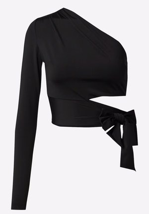 Haut asymétrique noir à manches longues avec un buste ajusté et un détail de nouage sur le côté, fabriqué en tissu lisse et extensible.