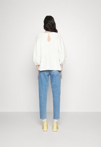Levi's® HIGH WAISTED MOM JEAN - Mom Jeans - summer house