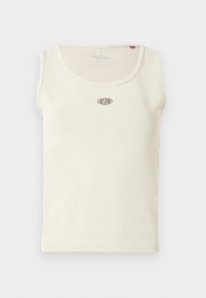 Débardeur sans manches de couleur crème avec encolure arrondie et petit logo ovale en métal centré sur la poitrine.