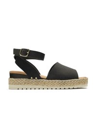 Black espadrille sandals with an open toe, a wide upper, and an ankle strap. Features a jute-wrapped wedge heel and rubber outsole.