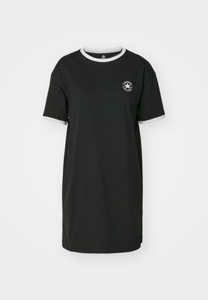 Vestido de camiseta de algodón negro con un cuello redondo blanco y acentos en las mangas. Presenta un logotipo circular en el pecho. Corte clásico y relajado.