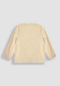 Maglietta beige a maniche lunghe con scollatura rotonda, morbida al tatto e con dettagli di cucitura sottili sulle spalle. Schiena liscia senza grafiche.