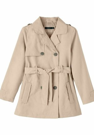 Trench-coat beige croisé avec col à revers, ceinture à la taille, épaulettes boutonnées et deux poches devant.