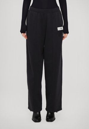 PANTS - Tracksuit bottoms - washed black