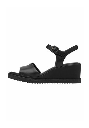 Black leather wedge sandals with a smooth upper, open toe, adjustable ankle strap, and textured rubber sole.