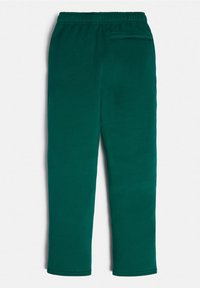 Ciemnozielone spodnie dresowe z elastycznym pasem, pojedynczą tylną kieszenią i zwężanymi nogawkami. Wykonane z miękkiego, teksturowanego materiału.