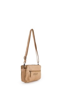 Beige crossbody bag made of smooth leather, featuring a long adjustable strap, one front zipper pocket, and two main compartments.