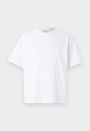 Hvid bomulds t-shirt, korte ærmer, rund hals. Enkel design, glat tekstur, ingen mønstre eller accenter. Standard lige snit.