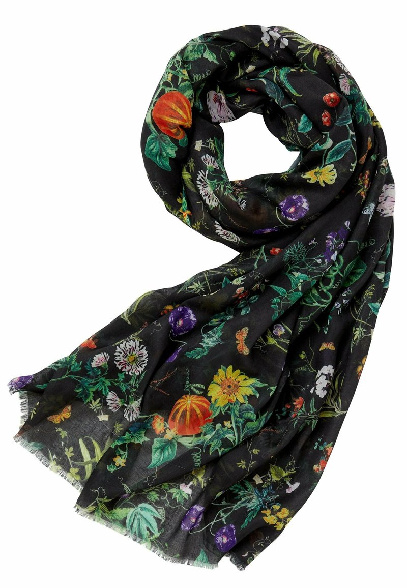 Écharpe noire avec des motifs floraux colorés et des citrouilles, pliée lâchement avec des bords frangés.
