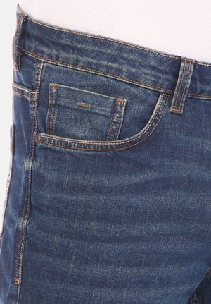 Dark blue denim jeans with a faded finish, featuring orange stitching, multiple pockets, and a classic 5-pocket design.