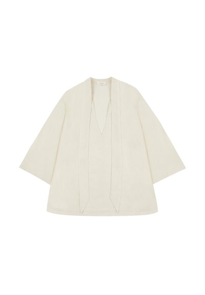 Leichtes Leinenoberteil in Off-White. Merkmale sind weite Ärmel, ein tiefes V-Ausschnitt und ein offenes Vorderdesign mit vertikalen Nähten. Glatte Textur.