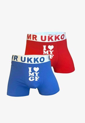 Twee paar boxershorts: één in het rood en één in het blauw. Beide hebben een witte tailleband met tekst en een bedrukt ontwerp met de tekst "I ❤️ MY GF".