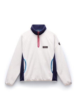 Fleece pullover, crème kleur met marineblauwe accenten. Kenmerkt zich door een hoge kraag, een halve rits met een rode trekker en zijzakken met blauwe bies.