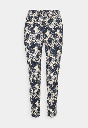Floral print pants in navy and cream. Made of soft fabric, featuring a drawstring waist and tapered leg design.