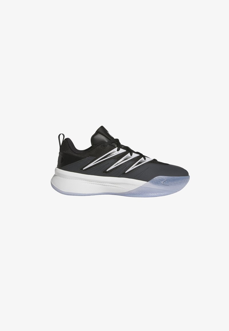 Chaussure de sport noire avec tige en mesh, accents blancs et gris, et une semelle en caoutchouc translucide avec un motif en chevrons.