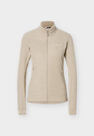 Beežist täis lukuga fliisjope kõrge kaeluse, pikkade varrukate, kahe külje lukuga tasku ja vasakul rinnal tagasihoidliku logoga.